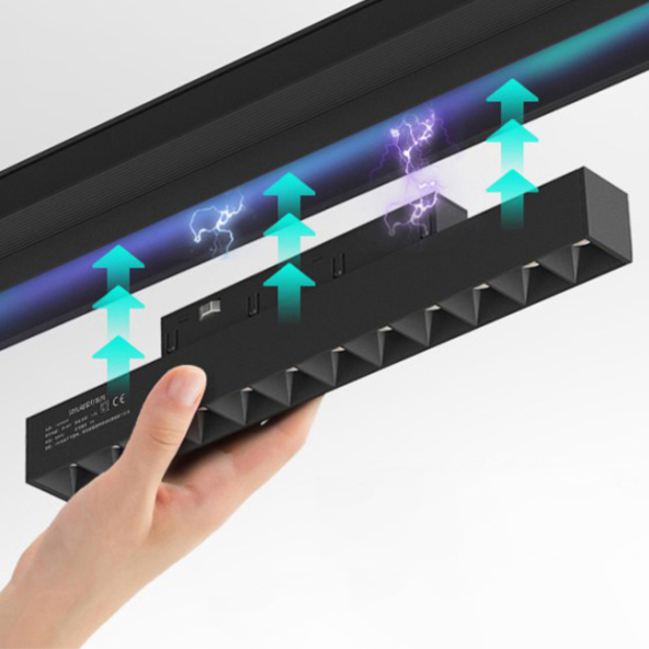 Magnetic track light installation demonstration hand snapping fixture onto rail